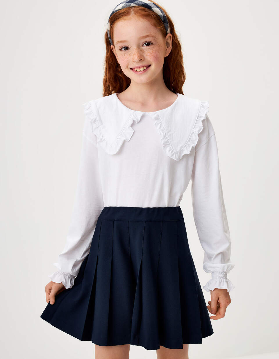 цена Трикотажная блузка с пышными рукавами для девочек