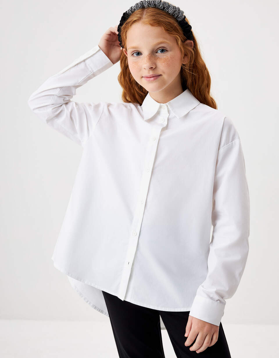 цена Свободная белая блузка для девочек
