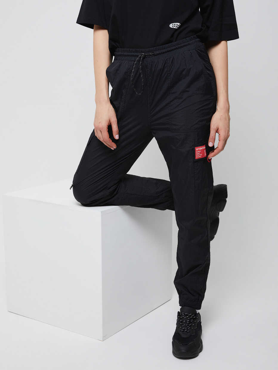 Нейлоновые брюки с накладными карманами, фото - 2