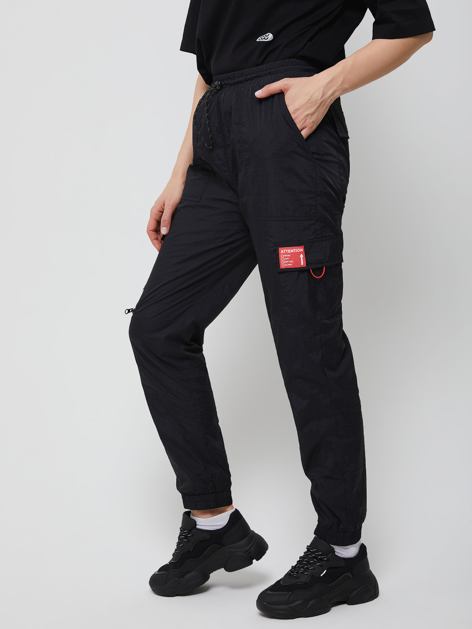 Нейлоновые брюки с накладными карманами, фото - 4