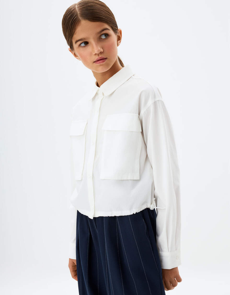 цена Укороченная белая рубашка для девочек